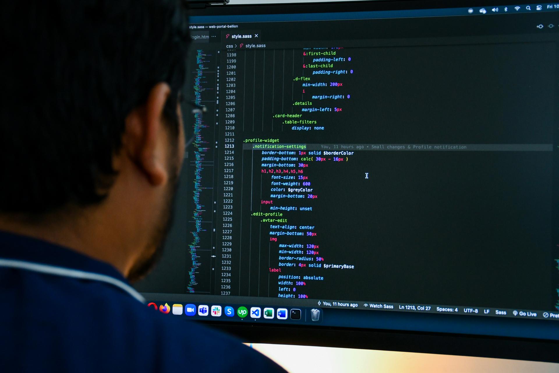Web development coding on laptop screen