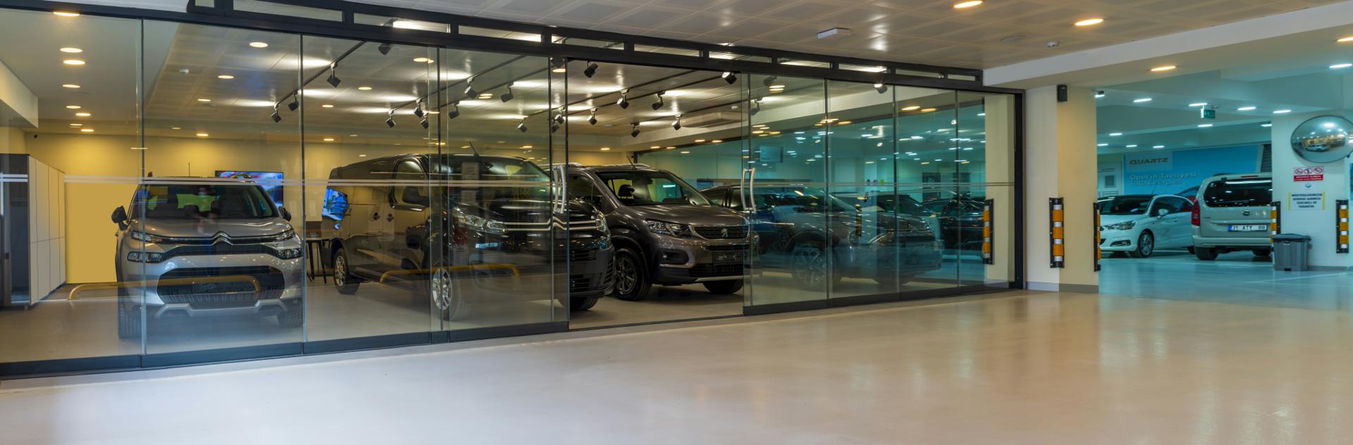 Car dealership with various vehicles on display